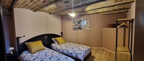 4 bedrooms, desk, iron/ironing board, travel cot