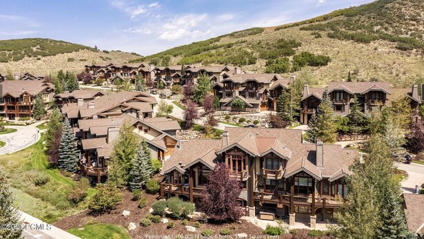 A resort with multiple wooden buildings, each with a balcony and a stone facade. - Beautiful, Comfortable, Well Appointed House; Amazing Views, Excellent Location (Park City)