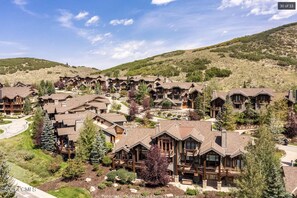 A resort with multiple wooden buildings, each with a balcony and a stone facade. - Beautiful, Comfortable, Well Appointed House; Amazing Views, Excellent Location (Park City)