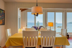 Dining - Oceanfront with private dock and float. Three bedroom, two bathroom cottage on Linekin Bay (Boothbay Harbor)