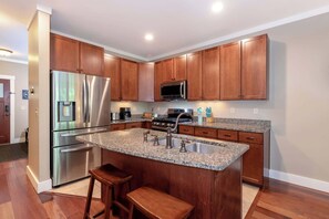 Fridge, microwave, oven, stovetop - Riverfront Condo w/ Hot Tub | River Swimming Spot! (Lincoln)