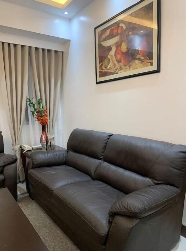 Living area - 1 Bedroom Executive Staycation (Taguig)