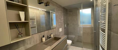 Hair dryer, bidet, towels, soap