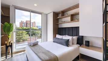 Premium bedding, down duvets, desk, laptop workspace