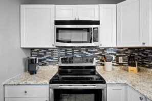 Condo, 1 Bedroom | Private kitchen | Fridge, oven, coffee/tea maker