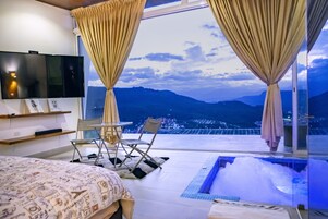 Premium bedding, down duvets, Select Comfort beds, free minibar