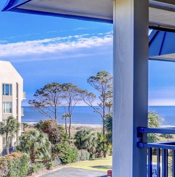 Enjoy breathtaking views of the coastal area from this property's spacious balcony.