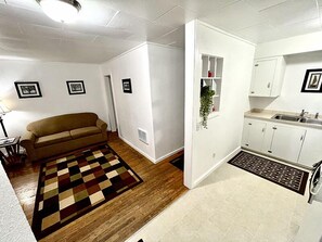 Cottage 10 (Dog Friendly) | Living area | Flat-screen TV - Cascade Motel (Cascade Locks)