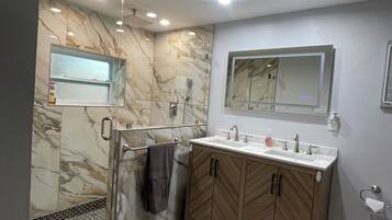 Shower, hair dryer, towels, soap