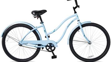 Ein hellblaues Fahrrad mit schwarzen Reifen und schwarzem Sattel.