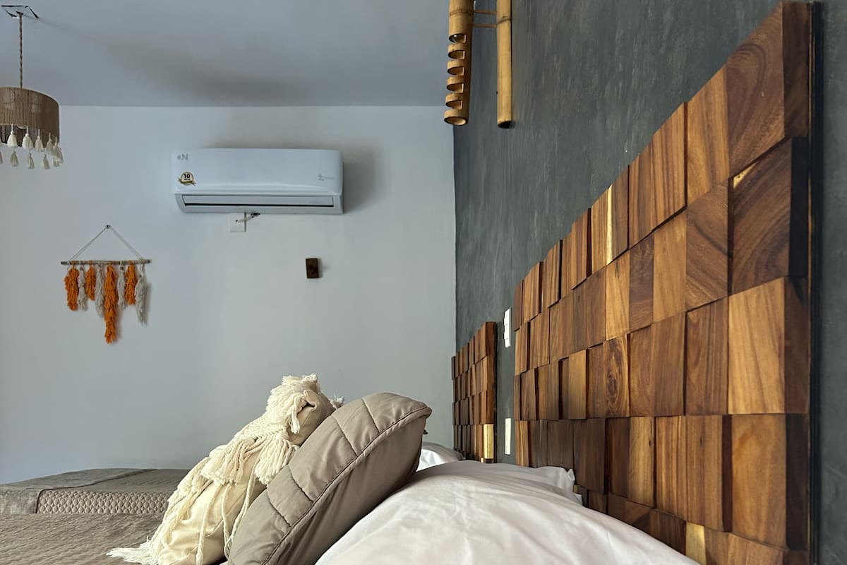 Chambre Deluxe, 2 grands lits, piscine privée, vue jardin