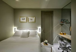 Hypo-allergenic bedding, pillowtop beds, minibar, individually decorated