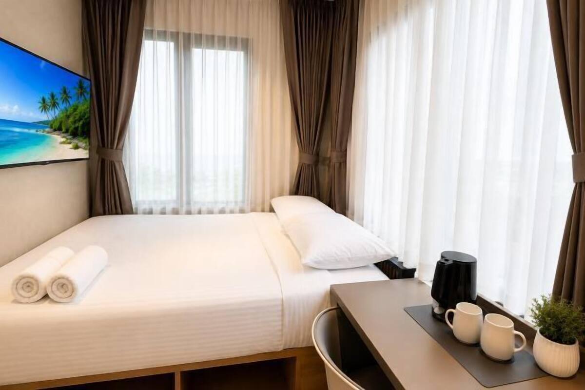 Literie de qualité supérieure, coffres-forts dans les chambres, bureau