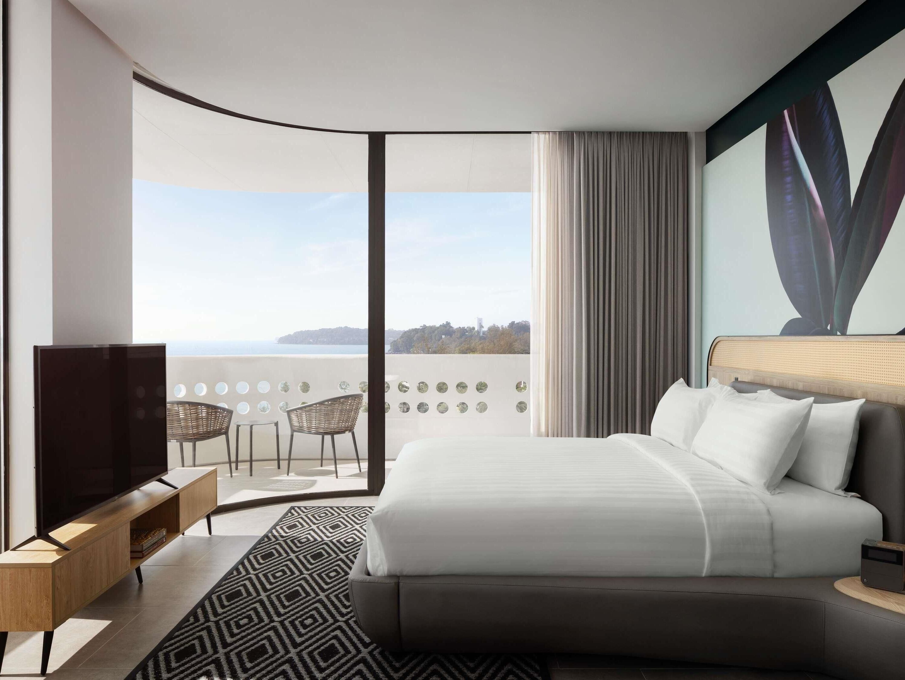 Premium bedding, desk, laptop workspace, soundproofing