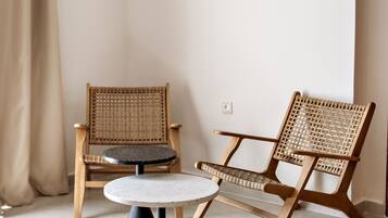 Suite superior | Área de sala de estar