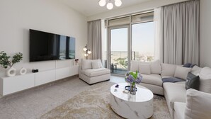 A modern living room with a flat-screen TV, two sofas, a coffee table, and a large window with curtains. - Maison Privee - Graceful Apt in Prestigious Dubai Hills close to the Golf Course (Dubai)