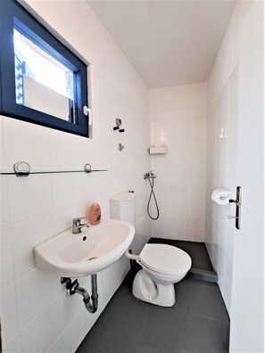 Shower, towels, soap, shampoo