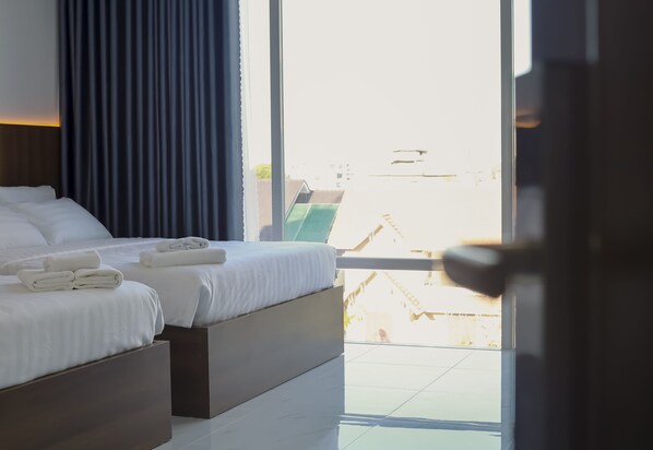 Family Room | Blackout drapes, soundproofing, iron/ironing board, free WiFi - Lilly (Ho Chi Minh City)