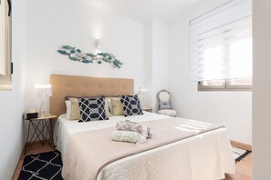 3 habitaciones, tabla de planchar con plancha y cuna de viaje