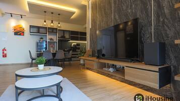 Design Apartment | Living area | Flat-screen TV, ping pong