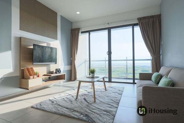 Comfort Apartment | Living area | Smart TV, Netflix, streaming services - Atlantis Residence Premium By I Housing (Malacca City)