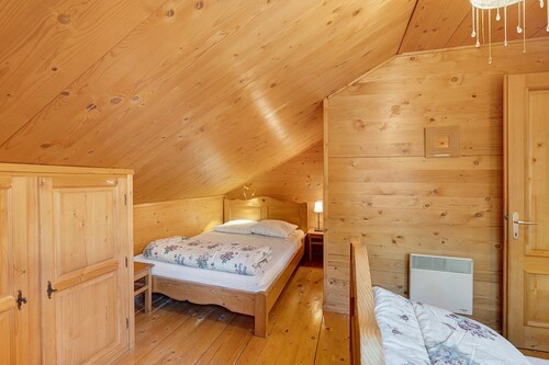 Chalet 'Garrigue Au Pied Des Pistes' with Mountain View, Shared Pool, and Wi-Fi