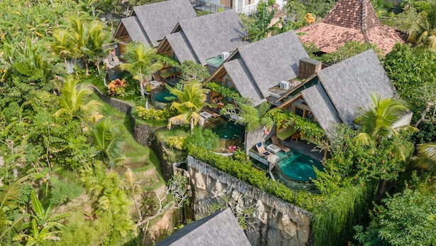 A resort with multiple bungalow-style accommodations, each with a private pool and surrounded by lush tropical vegetation. - Wana Bucu Villas by GenuineHost (Ubud)