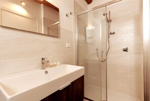 Hair dryer, bidet, towels