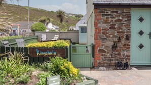 A building with a stone facade and a sign reading "Kingsholm." - Kingsholm (Truro)
