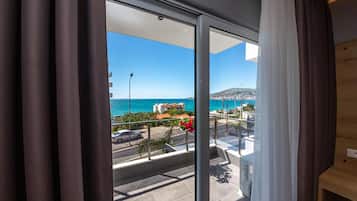 Deluxe Double Room, Balcony, Sea View | 1 bedroom, in-room safe, desk, blackout drapes