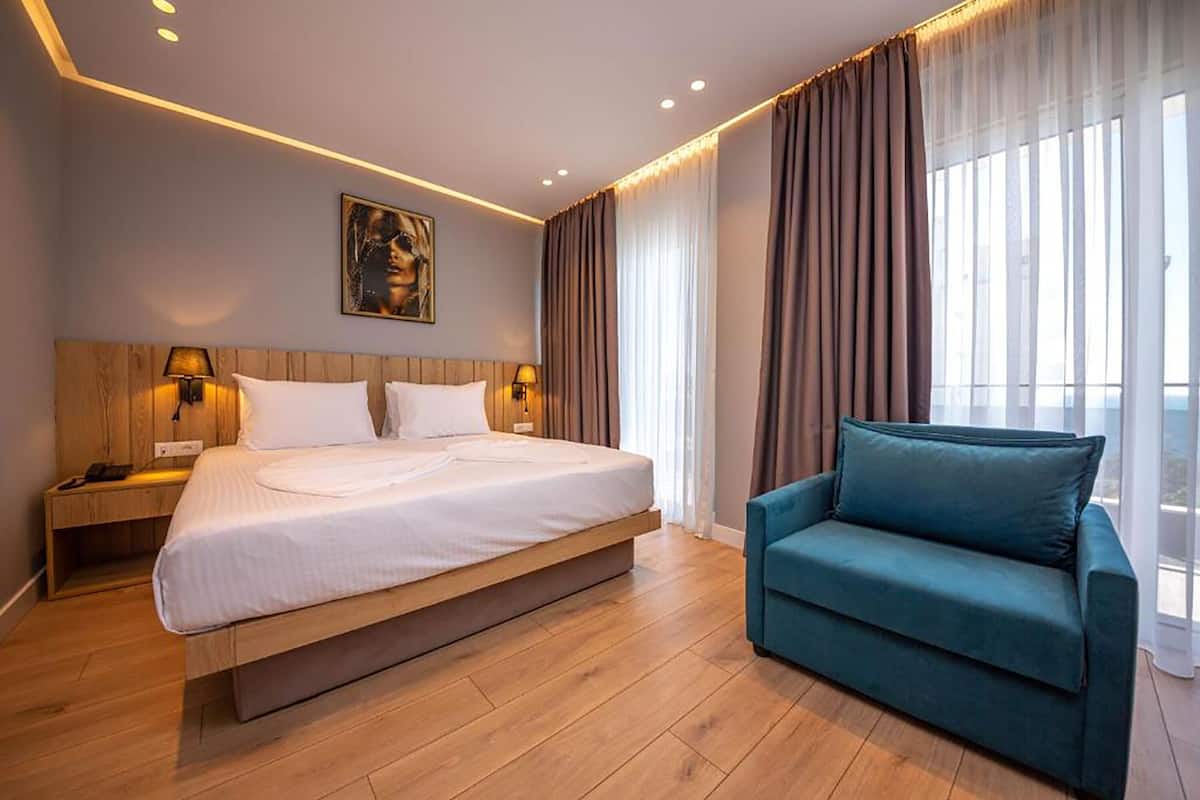Deluxe-Doppelzimmer, Balkon, Meerblick | 1 Schlafzimmer, Zimmersafe, Schreibtisch, Verdunkelungsvorhänge