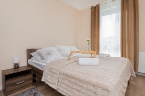 1 habitación, tabla de planchar con plancha, wifi y ropa de cama 