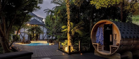 Outdoor pool, open 9:00 AM to 10:00 PM, pool loungers