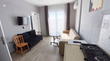 Comfort Apartment, Smoking, Partial Sea View | Desk, free WiFi, bed sheets