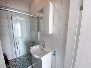 Ducha, secador de pelo, toallas