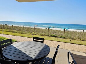 Outdoor dining - Sandy Key 113: 2 BR/2 BA Beachfront in Perdido Key, FL On-Site Rental Office Sleeps 6 (Pensacola)
