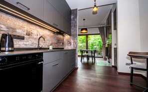 Superior Apartment | Private kitchen | Oven, stovetop, dishwasher, cookware/dishes/utensils - InPoint Old Town- Apartment with garden  (Kraków)