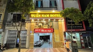 A hotel with a prominent sign reading "TUAN NAM HOTEL" at the top. - Tuan Nam Hotel (Hai Phong)
