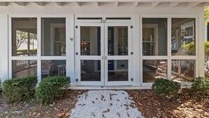 A building entrance with a glass door marked "237". - Golf Cart | 500 Yards to Beach | Bikes (Watersound)