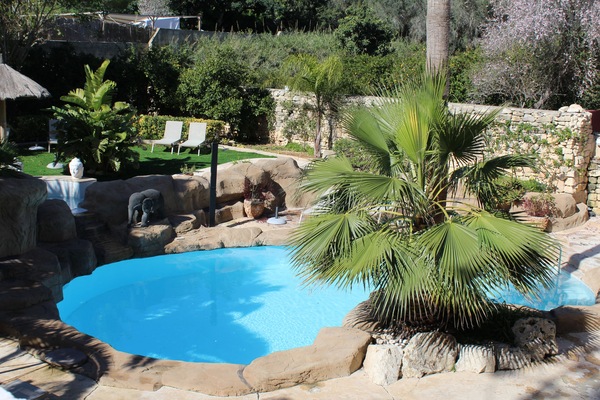 Indoor pool, outdoor pool, open 9:00 AM to 10:00 PM, pool umbrellas