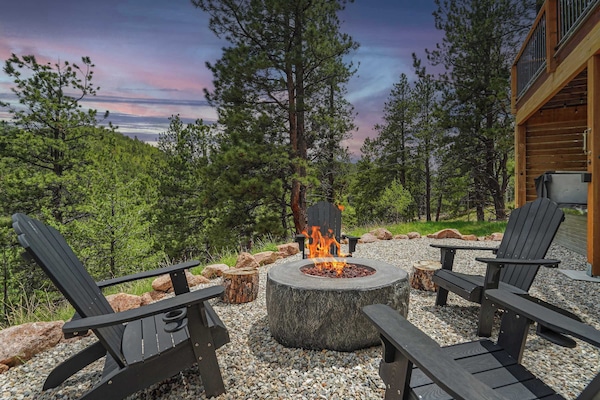 Welcome to Valley Vista Lodge! Unwind in this mountain retreat, where cozy evenings by the fire pit meet breathtaking forest views. Escape the ordinary and embrace nature in ultimate comfort.