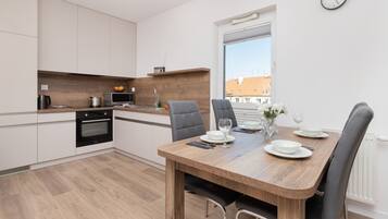 Apartment, 1 Bedroom, Balcony | Private kitchenette | Microwave, dishwasher, cookware/dishes/utensils