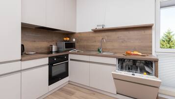 Apartment, 1 Bedroom, Balcony | Private kitchenette | Microwave, dishwasher, cookware/dishes/utensils