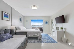 Fer et planche à repasser, lit parapluie, Wi-Fi, draps fournis