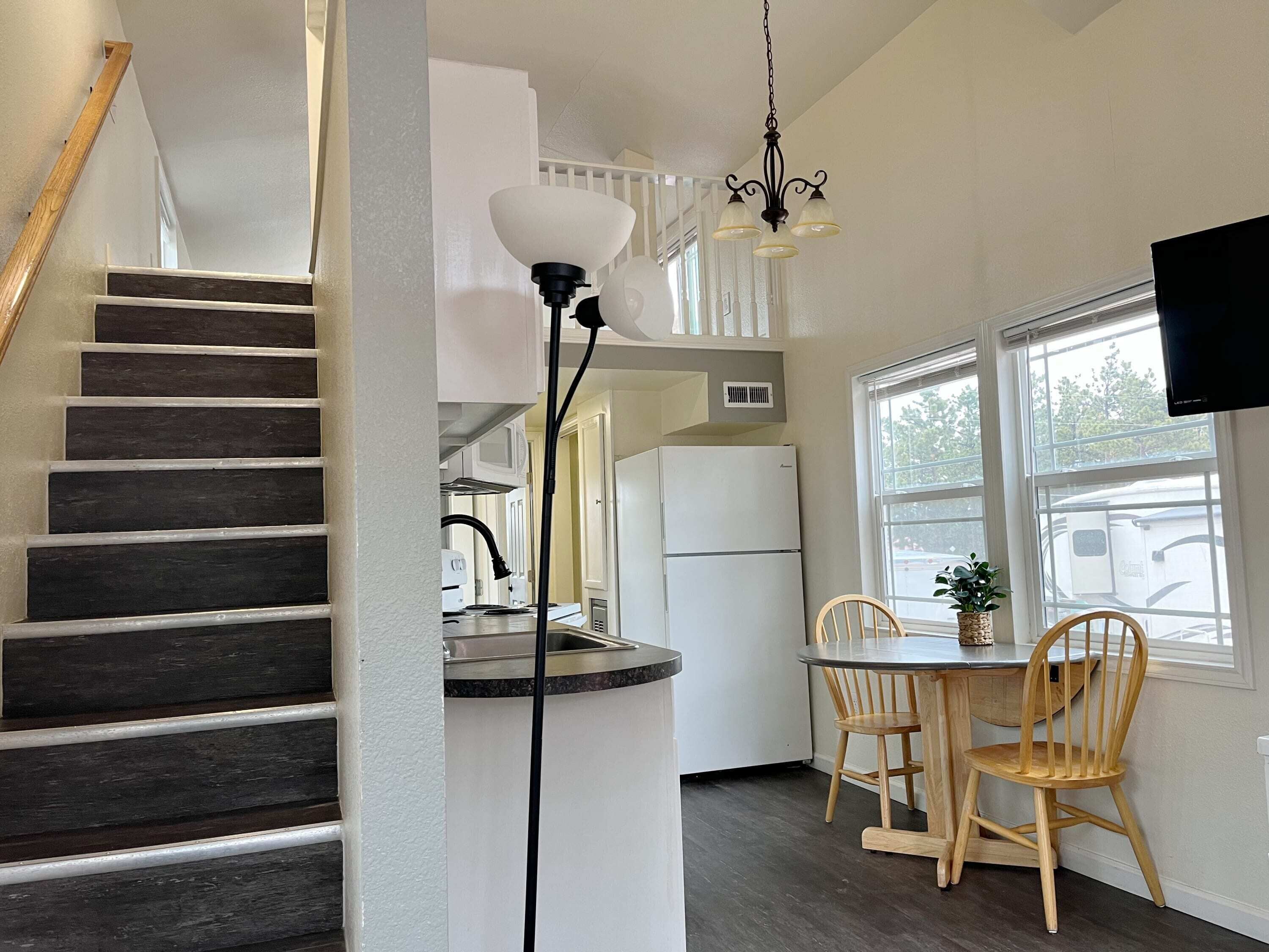 Fridge, microwave, oven, dining tables