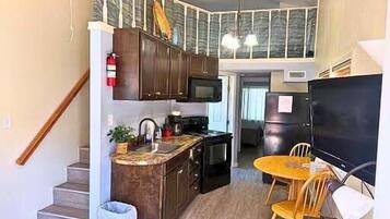 Fridge, microwave, oven, dining tables