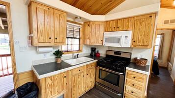 Fridge, microwave, stovetop, coffee/tea maker