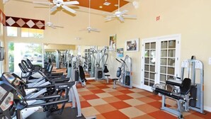 A gym with treadmills, elliptical machines, and weight equipment. - South Pool | Waterslide | Golf | Near Disney 2609 (Davenport)