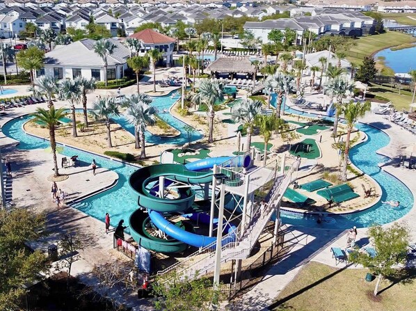 A water park with multiple pools, slides, and a wave pool.