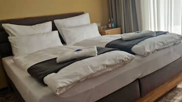 1 habitación, ropa de cama de alta calidad, cubrecamas y minibar